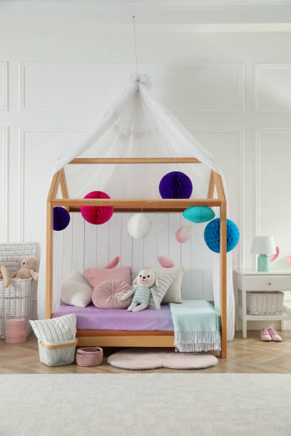 istock Stylish room for kid with house bed. Interior design 1397222159