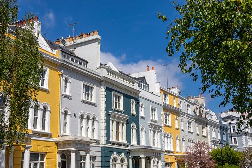 Beautiful facades of houses in the Notting Hill area of London, UK.