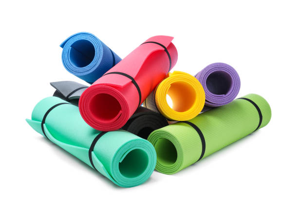istock Colorful rolled camping or exercise mats on white background 1397223098