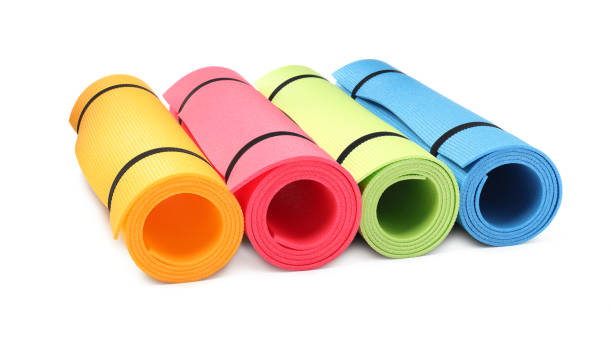 istock Colorful rolled camping or exercise mats on white background 1397223122