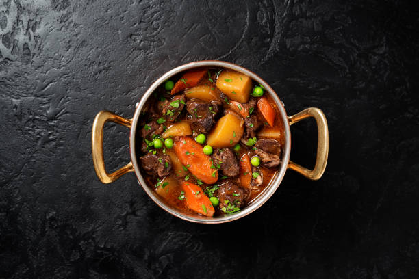 istock Irish stew made with beef, potatoes, carrots and herbs 1397223511
