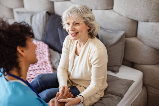 istock District nurse visiting a patient at home 1397226802