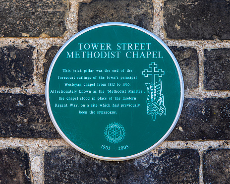 A plaque located on the site where the Tower Street Methodist Chapel once stood in Kings Lynn in Norfolk, UK, detailing the history of the building.