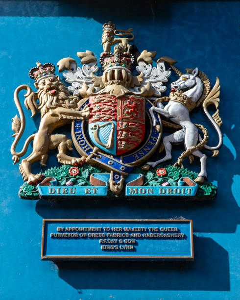 Royal Coat of Arms above a Shop in Kings Lynn, Norfolk, UK stock photo