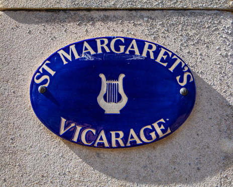 A plaque on the exterior of St. Margarets Vicarage, located on St. Margarets Place in Kings Lynn, Norfolk, UK.