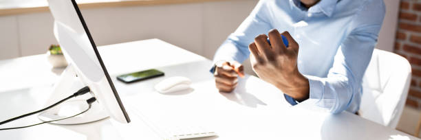 istock Businessman Holding Stress Ball 1397234646
