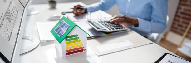 istock Businessman Calculating House Energy Cost 1397234664