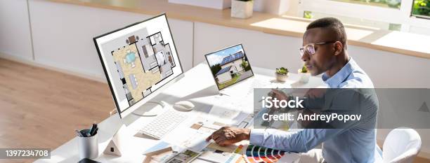 Real Estate Designer Working On Computer Stock Photo - Download Image Now - Home Addition, People, Business