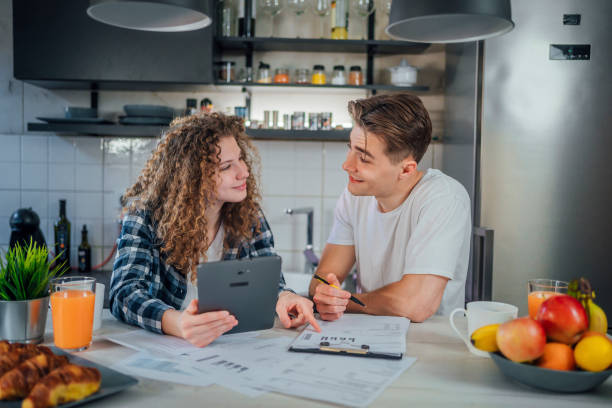 istock Couple manage house finances 1397234756