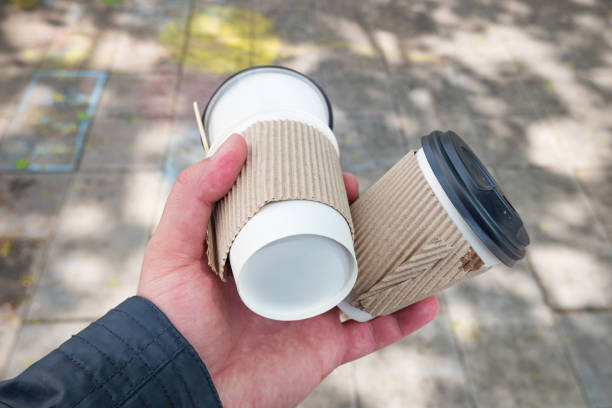 istock Used paper disposable coffee cups collected for recycling paper. 1397235592