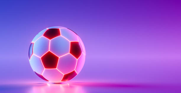 Soccer ball with neon futuristic lights on purple shiny background. 3d render stock photo