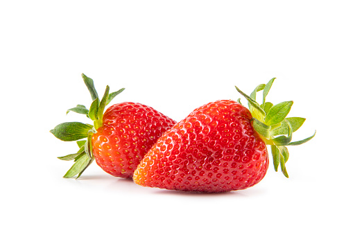 Two strawberries isolated on white background