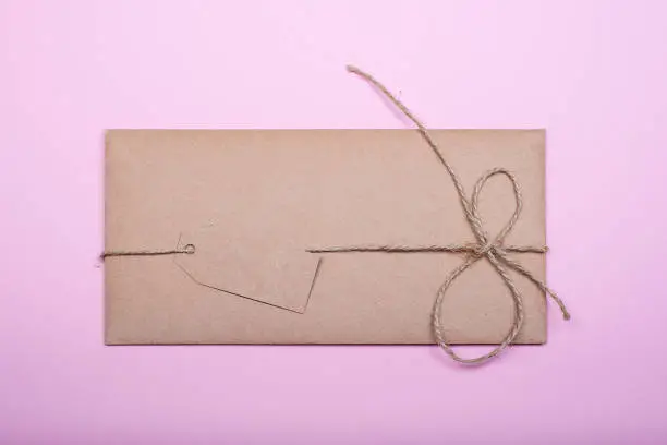 Closeup of the handcrafted envelope made with brown wastepaper