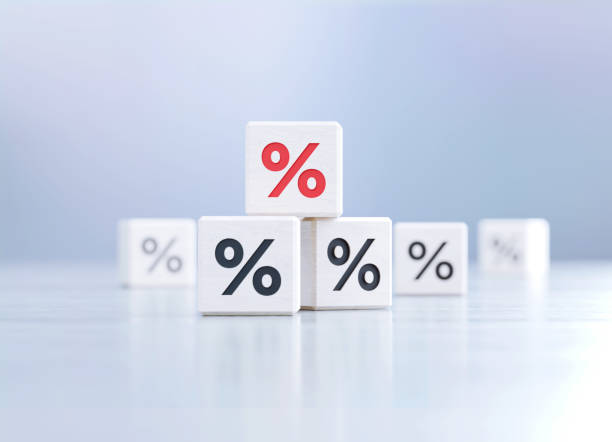 istock Percentage Sign Written White Cubes Sitting Before Defocused  Background 1397238471