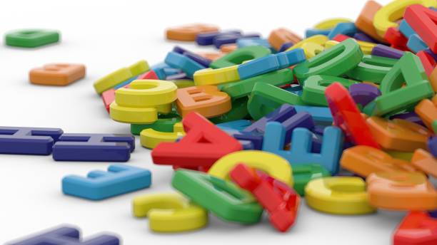 istock Alphabet letters on plain background. Plastic alphabet letters on white background. Rainbow colors. 3D illustration. 3D rendering 1397240398