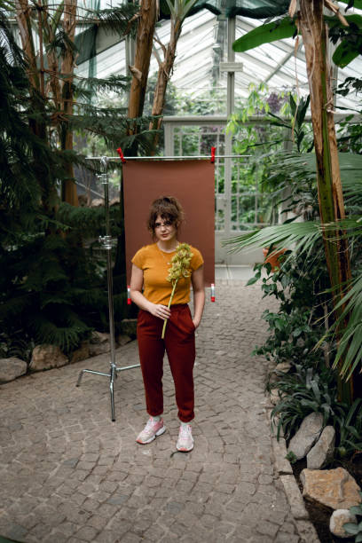 istock Young woman in a botanical garden 1397241153