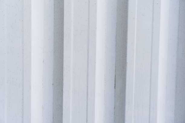 istock White aluminum structure texture. Different levels of elevation. White corrugated metal texture surface panorama or galvanized steel background 1397243496