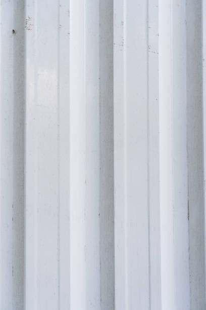 istock White aluminum structure texture. Different levels of elevation. White corrugated metal texture surface panorama or galvanized steel background 1397243517
