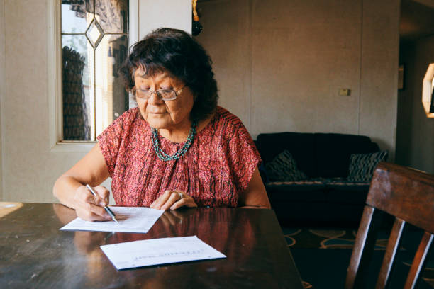 Woman Voting With a Mail In Election Ballot