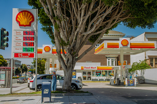 San Francisco, CA - May 14th, 2022: Gas station sign on Lombard Street in San Francisco is showing record high prices above $6.00/gallon