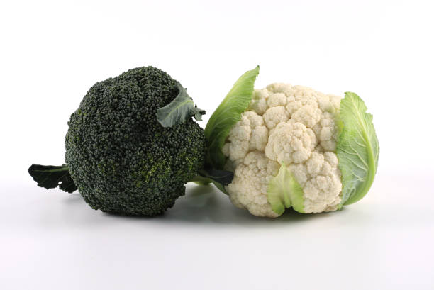 istock Fresh broccoli and cauliflower isolated on white background. 1397253259