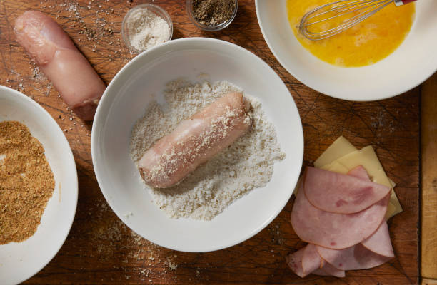 preparación de pollo cordon bleu - chicken rolled up meat stuffed chicken fotografías e imágenes de stock