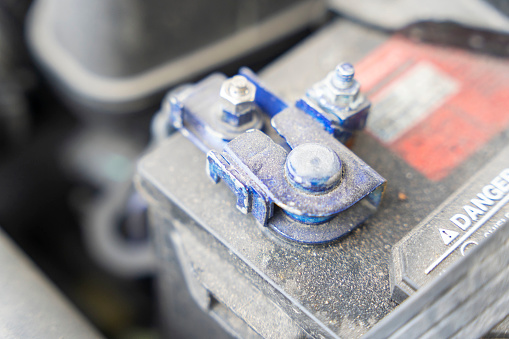 the battery terminal of a modern car. close-up of a car battery terminal.