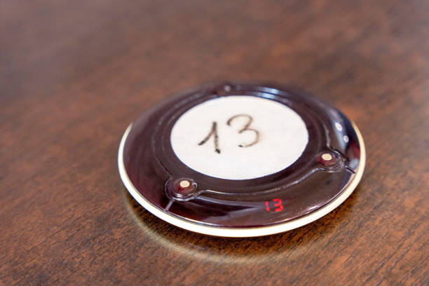 Wireless queue calling system. a pager for a restaurant with number 13 stock photo