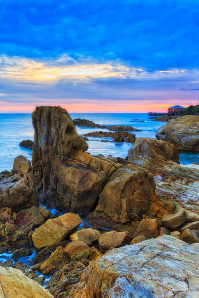 istock Sea Tathra rocks vert to rise 1397261201
