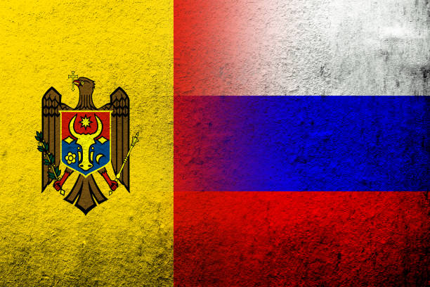 nationalflagge der russischen föderation mit der nationalflagge der republik moldau. grunge-hintergrund - president of russia stock-grafiken, -clipart, -cartoons und -symbole