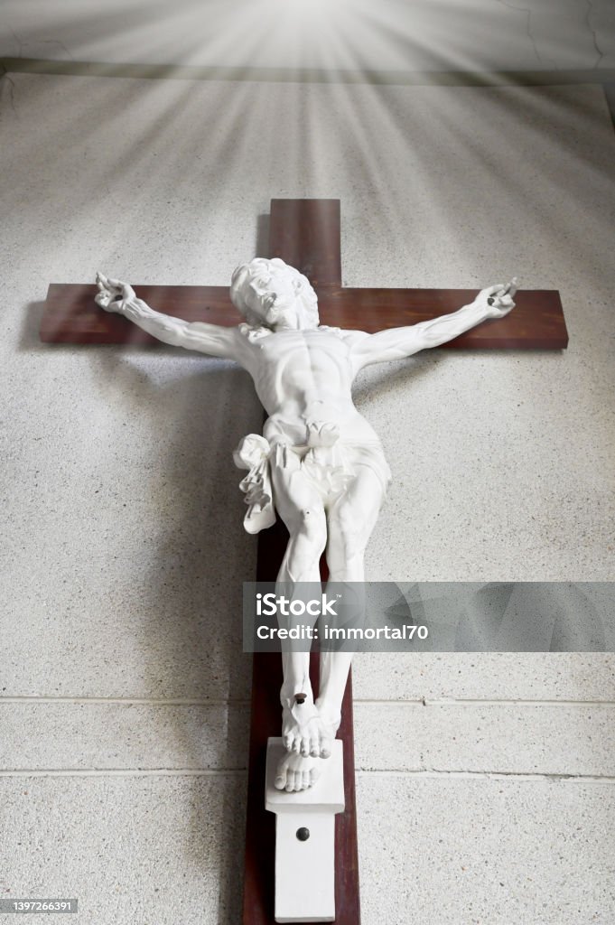 Jesus christ on the cross with Wall background in catholic church, Thailand. selective focus. Abstract Stock Photo