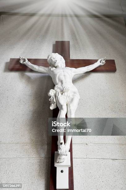Jesus Christ On The Cross With Wall Background In Catholic Church Thailand Selective Focus Stock Photo - Download Image Now