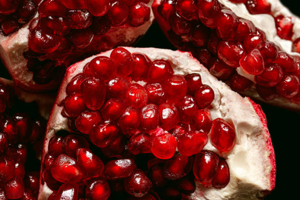 Pomegranate fruit. Close up Food background with pomegranate fruit. Top view. pomegranate stock pictures, royalty-free photos & images