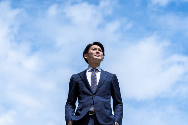 Free Stock Photo of Man With Fur Collar Standing in Front of Blue Sky ...