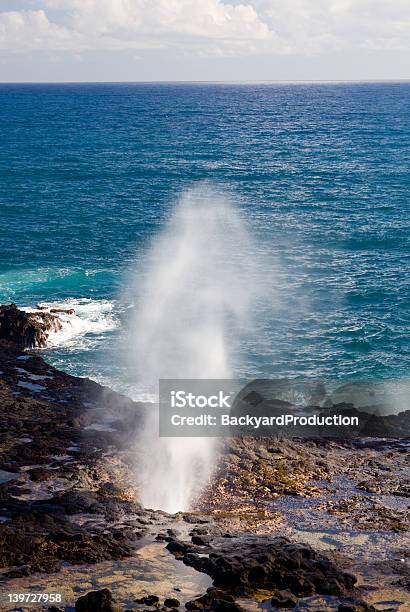 Spouting Horn Off Poipu In Kauai Stock Photo - Download Image Now - Active Volcano, Beach, Blow Hole