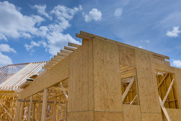 istock Exterior view of a new house under construction framing 1397284745