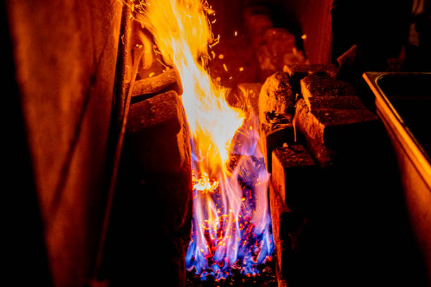 istock Flame on coal burning in kiln for katana, Japanse sword smith. 1397287796