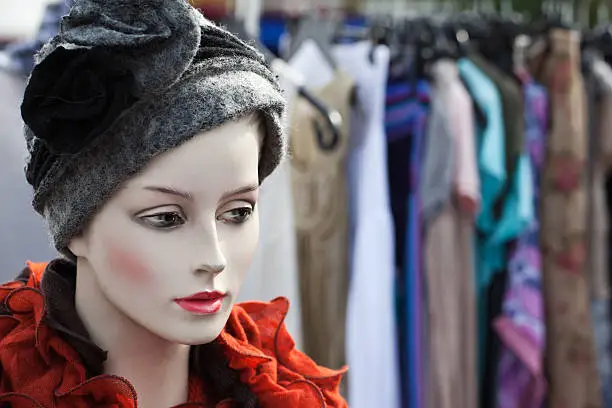 hatted woman dummy at the flea market