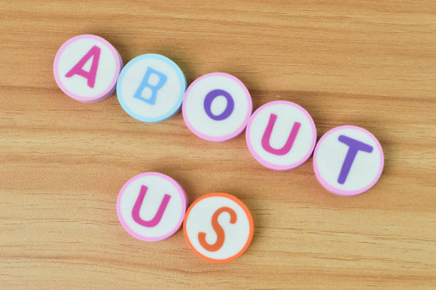 istock Top view of alphabet letters with text ABOUT US. 1397297239