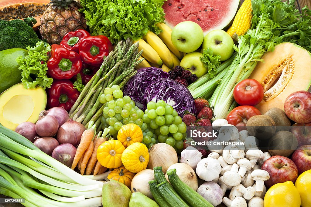 Assortment of Fruits and Vegetables Background. Assortment of Fruits and Vegetables Background Fruit Stock Photo