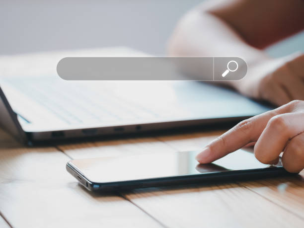 istock Search Engine, search information on internet online. Women using cell phone searching data on Website online finding information. Concept of SEO, Mobile, Smartphone, Technology, Laptop Computer 1397300690