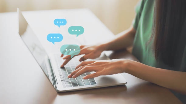 istock Woman using computer laptop on wood desk. Online message live chat chatting on application communication digital media website and social network 1397301588