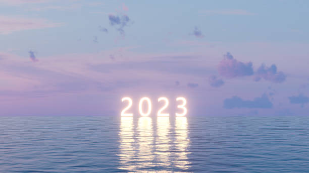 2023 neon light text on sea stock photo