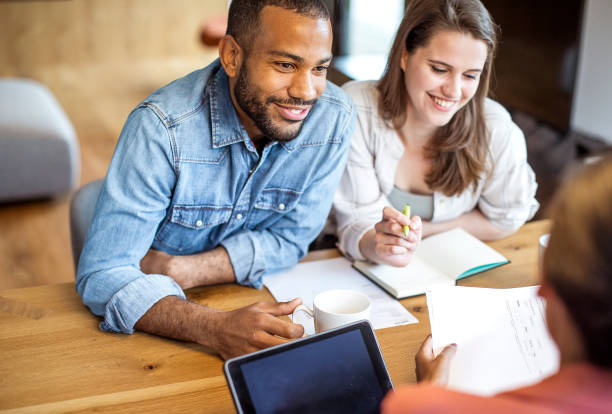 istock Young couple planning their finances together 1397310111