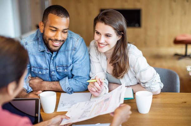 istock Young couple planning their finances together 1397310116