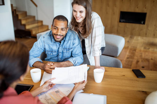 istock Young couple planning their finances together 1397310117