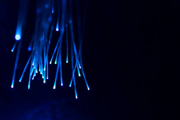 istock Neural networks.Blue neon lightnings of bokeh lights and reflections.Selective focus. 1397310194