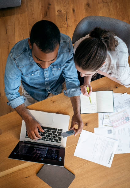 istock Young couple planning their finances together 1397310492