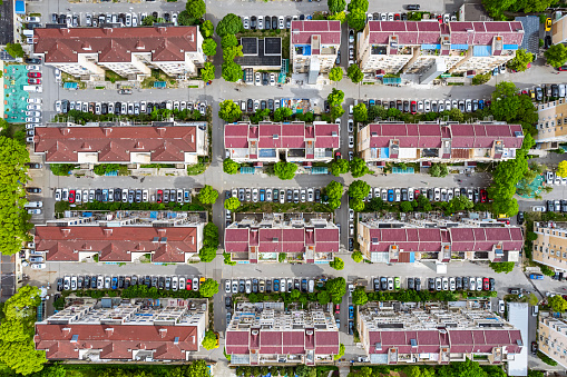 Aerial view of apartment buildings in residential compound from above