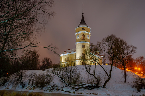 The castle of the Russian Emperor Paul I - Mariental (BIP Fortress) on winter snow-covered cloudy evening, Pavlovsk, Saint Petersburg, Russia